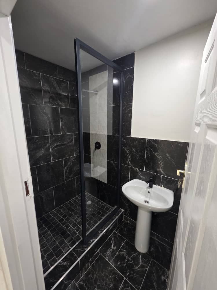 Bathroom with an enclosed shower