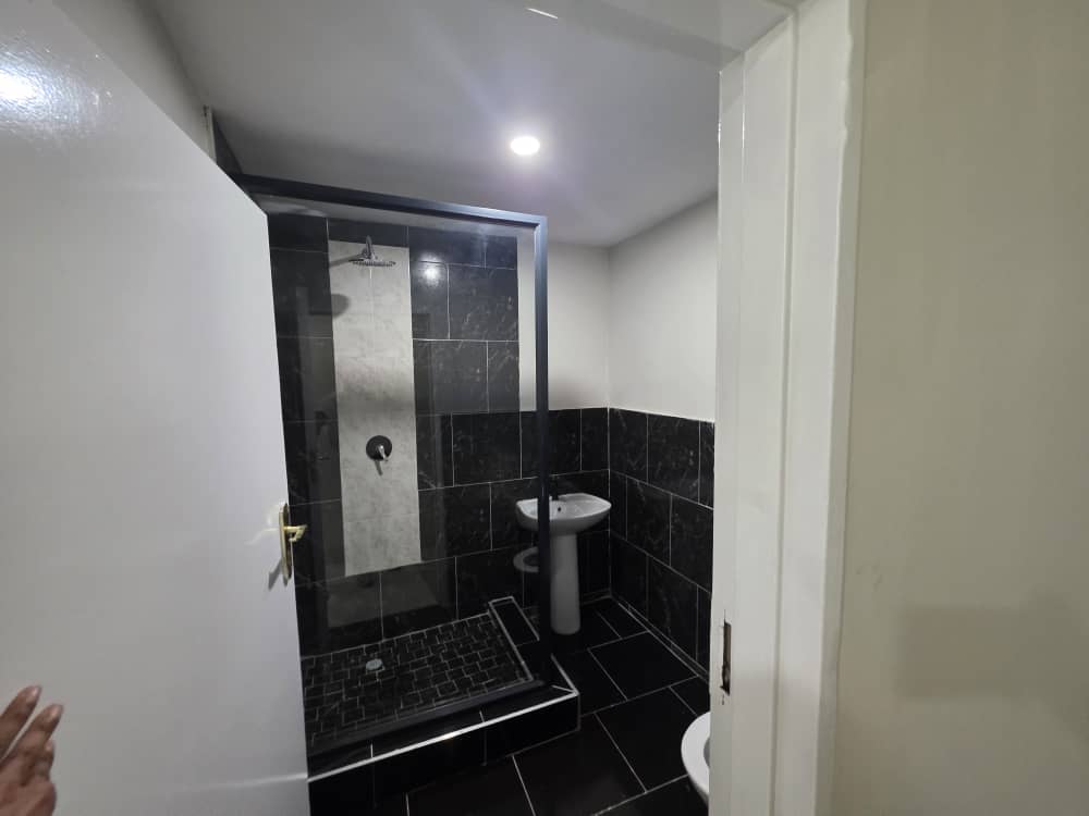 Dark tile bathroom details